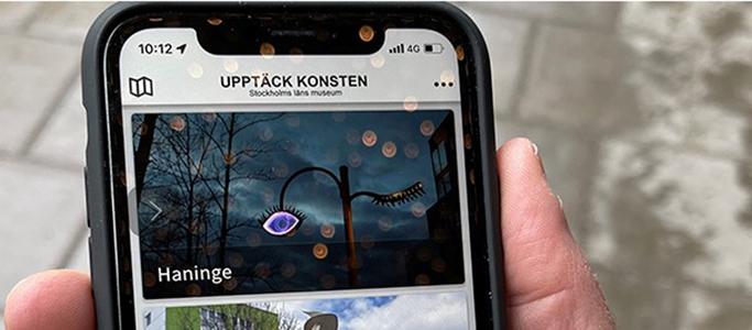 Bild av mobil med appen Upptäck konsten på skärmen